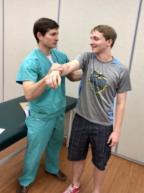 Orthopaedic Surgeon and Sports Medicine Specialist Jeff Witty, MD, of North Oaks Orthopaedic Specialty Center examines Grahm Casse, a 17-year-old soccer player and cross country runner at Hammond High Magnet School.
